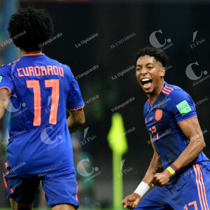 Juan Guillermo Cuadrado y Johan Mojica