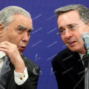 Julio Mario Santo Domingo y Álvaro Uribe Vélez